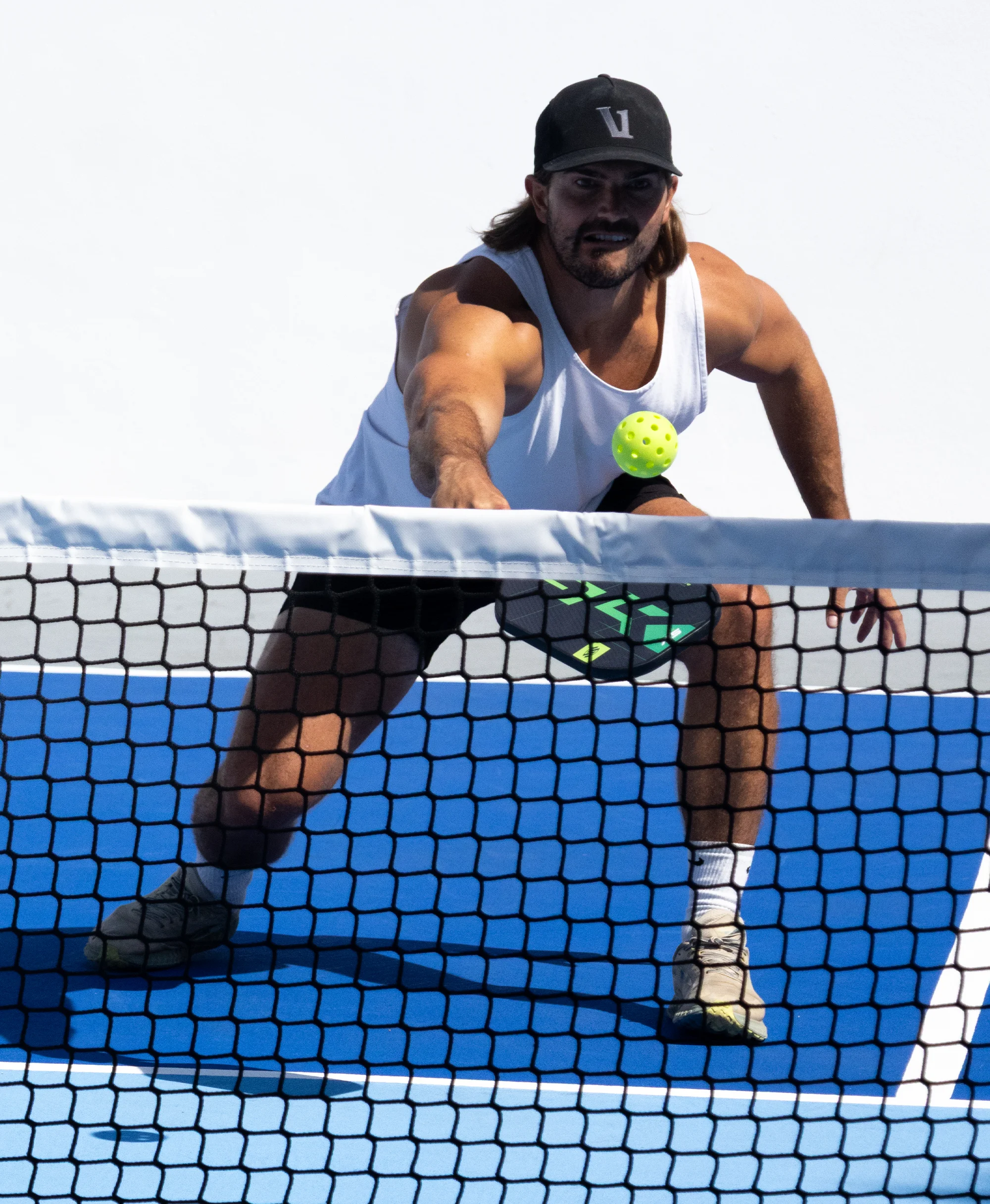 Players on Nawalli pickleball courts